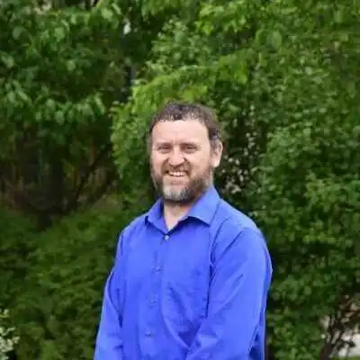 Chris Comstock, M.Ed.