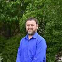 Chris Comstock, M.Ed.