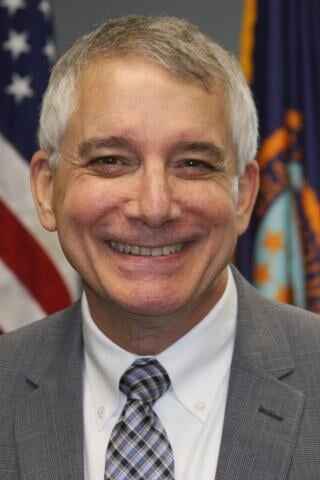 Dr. Robert J. Fischer, MD, FACOG, CPE